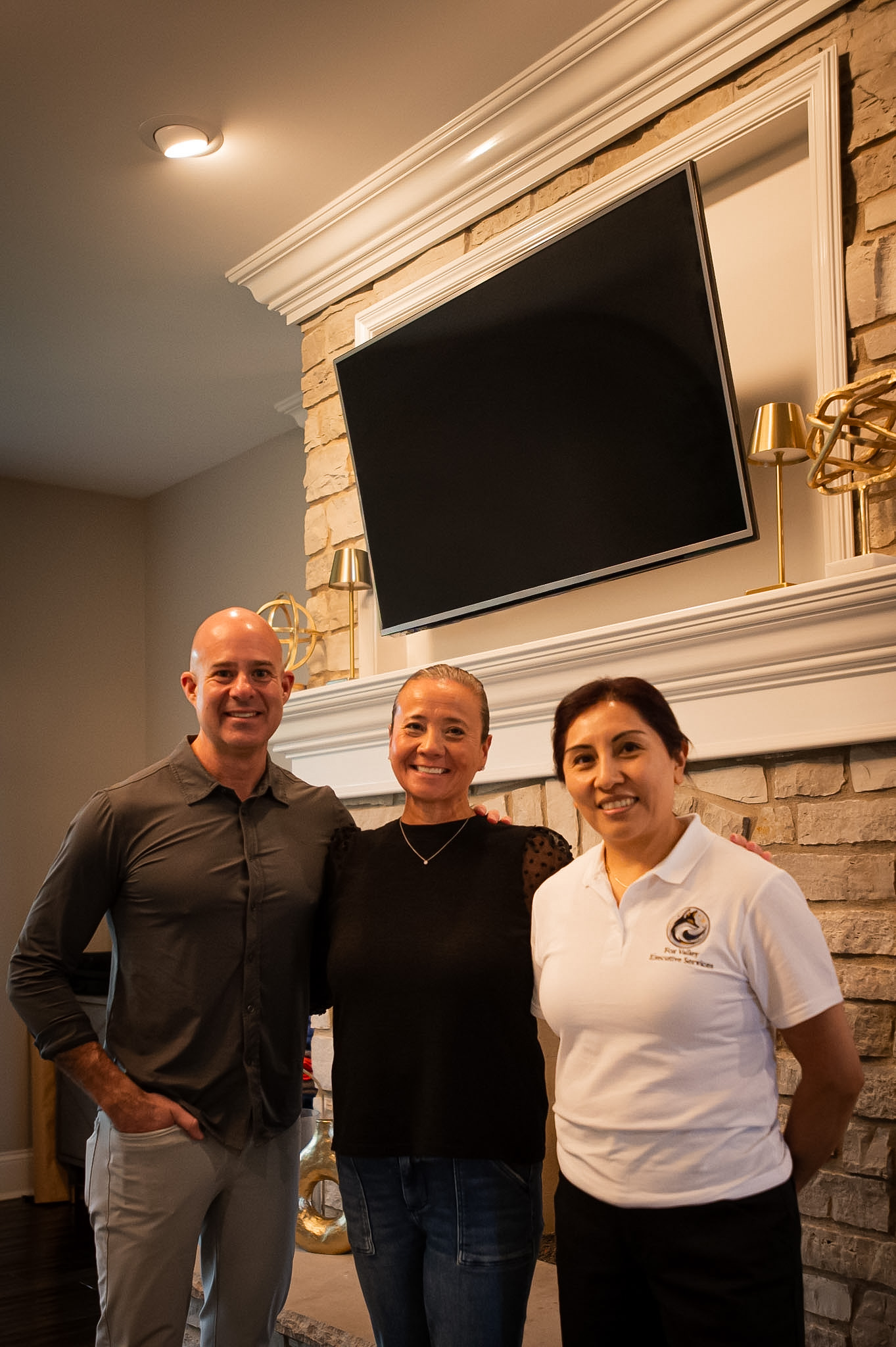 Jackie C standing with the Turoff Family